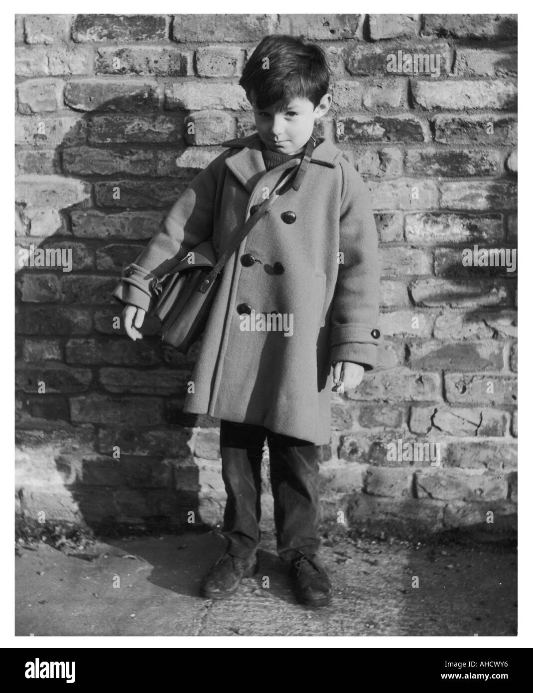 Boy With Satchel Photo Stock Photo