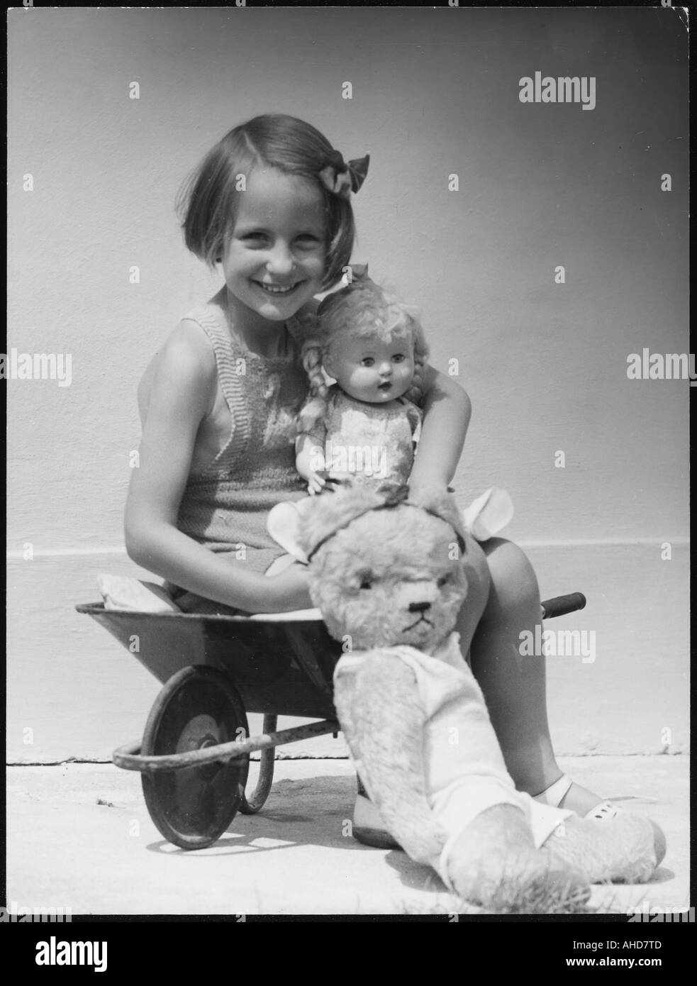 Girl With Toys 1940s Stock Photo - Alamy