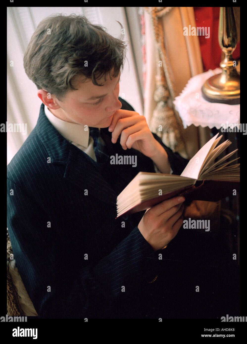 Young Man Reading Stock Photo