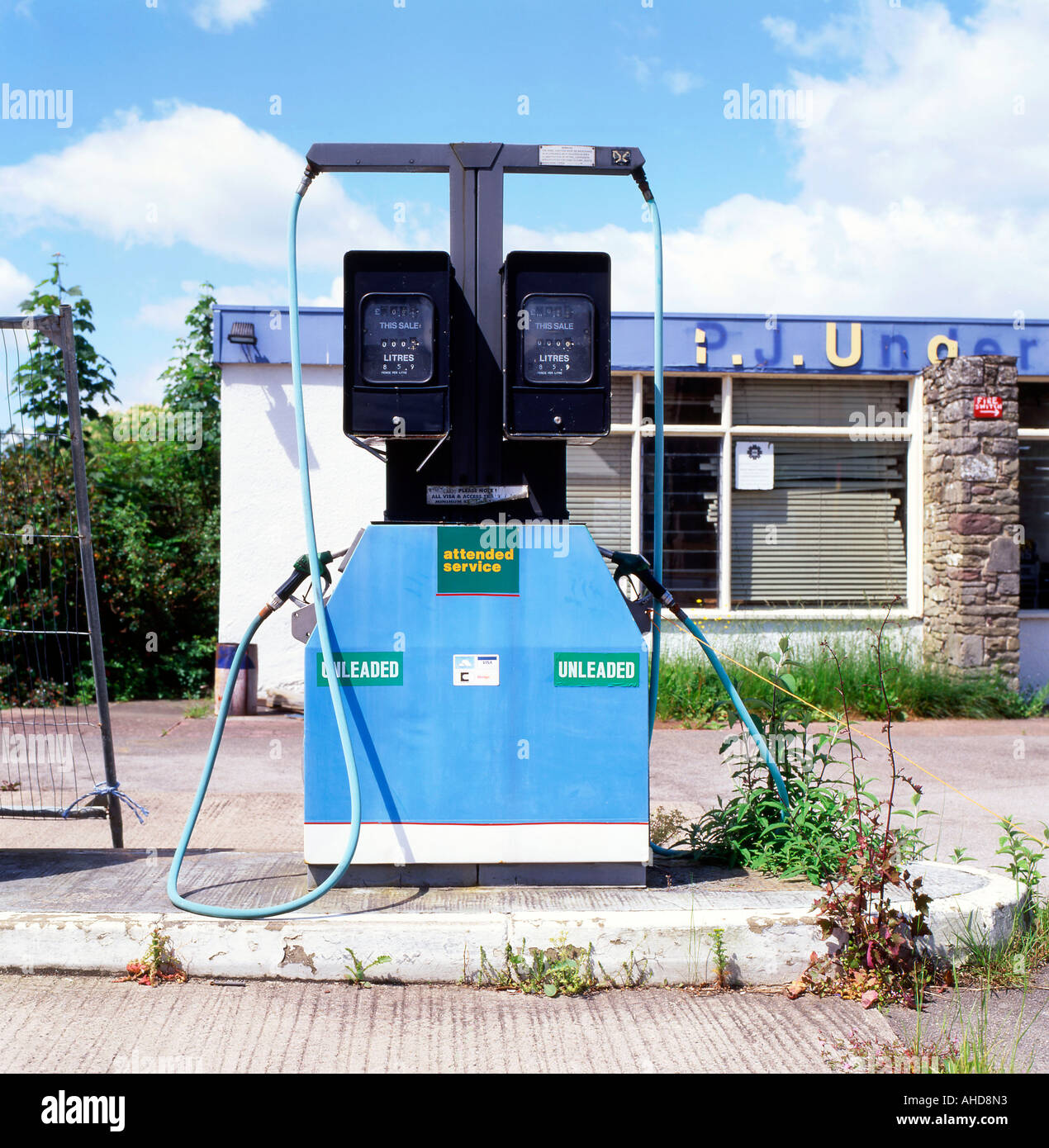 Redundant petrol pumps pump not in use at gas station in HayonWye Powys Wales UK KATHY DEWITT