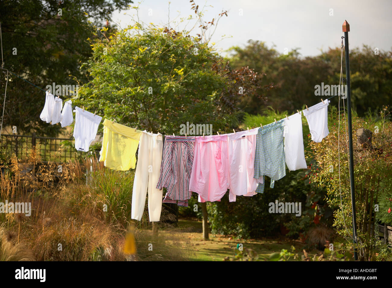 washing hanging on line outside in garden Stock Photo