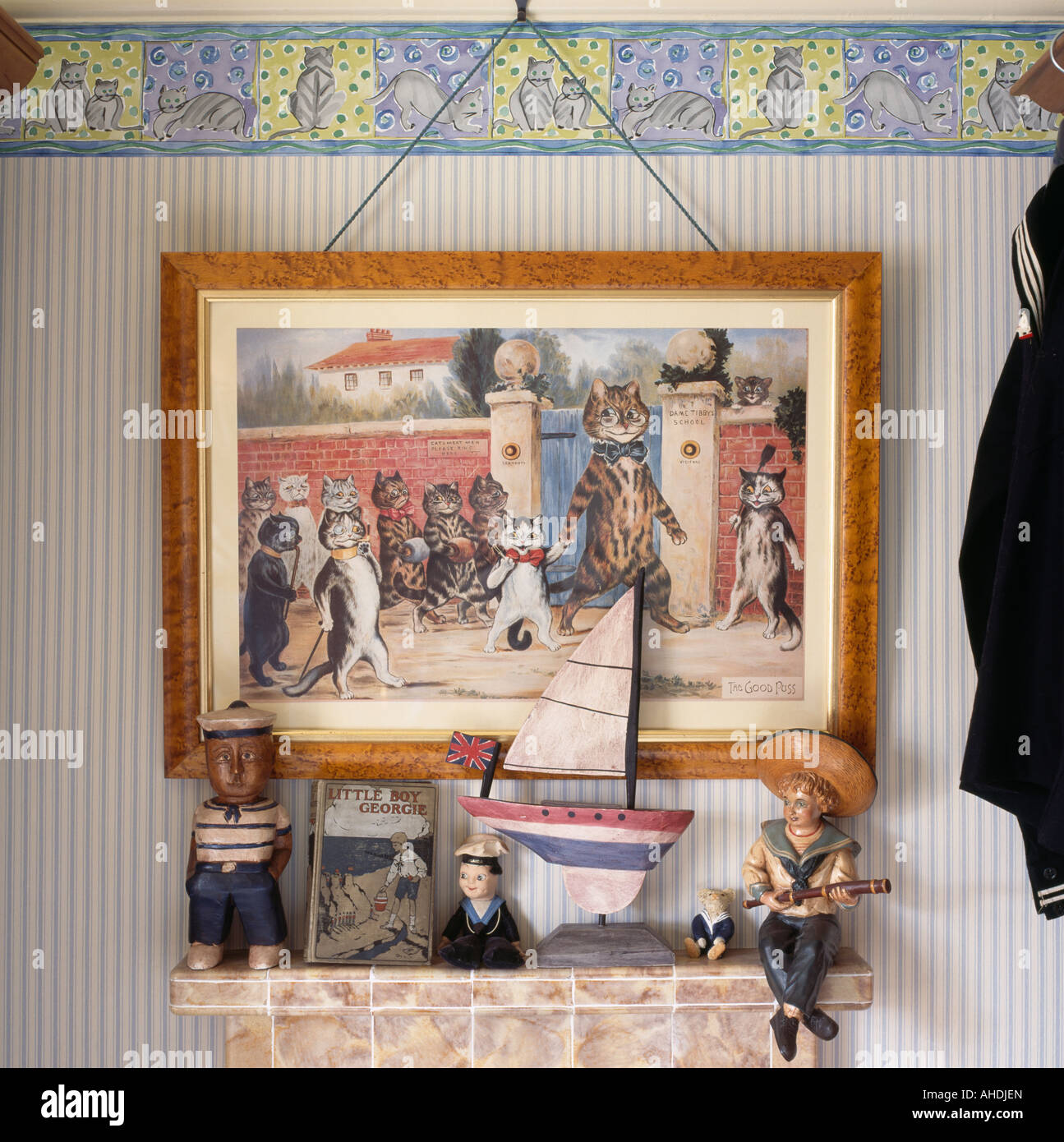 Thirties china boat and sailor figurines on mantelpiece below old