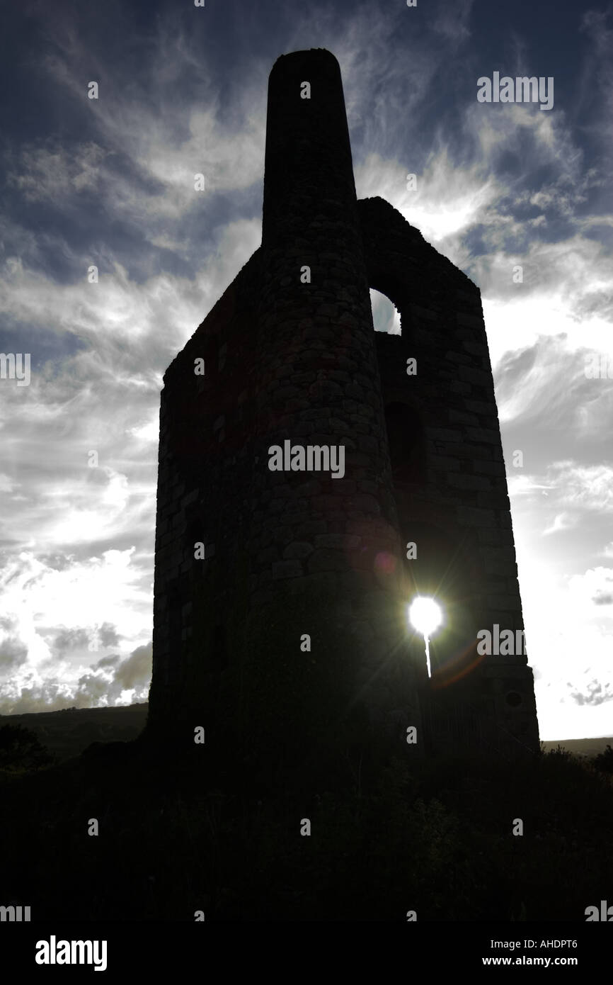 Cornish engine house in silhouette Stock Photo