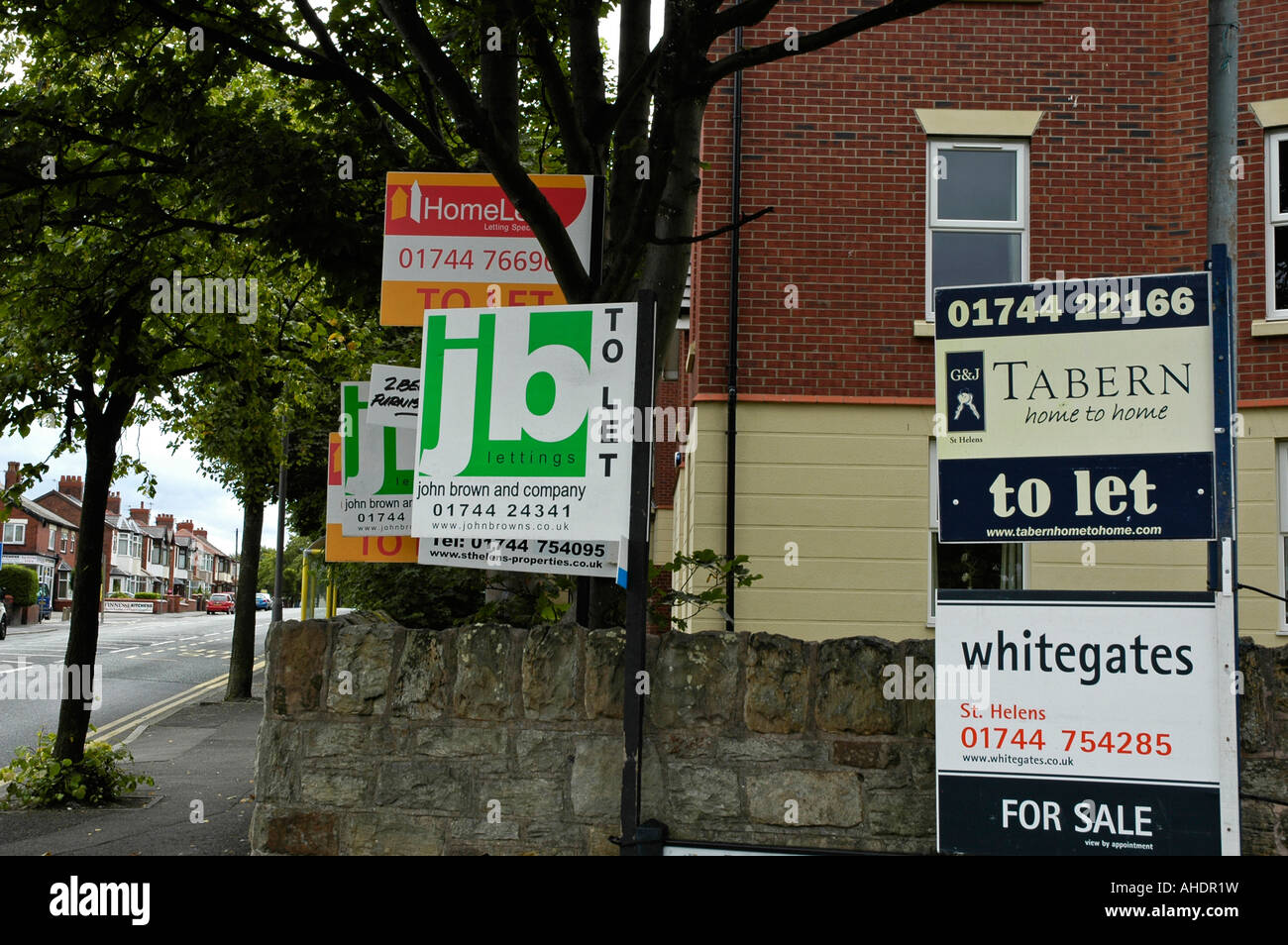 for sale and to let signs on new properties in st.helens north west england Stock Photo