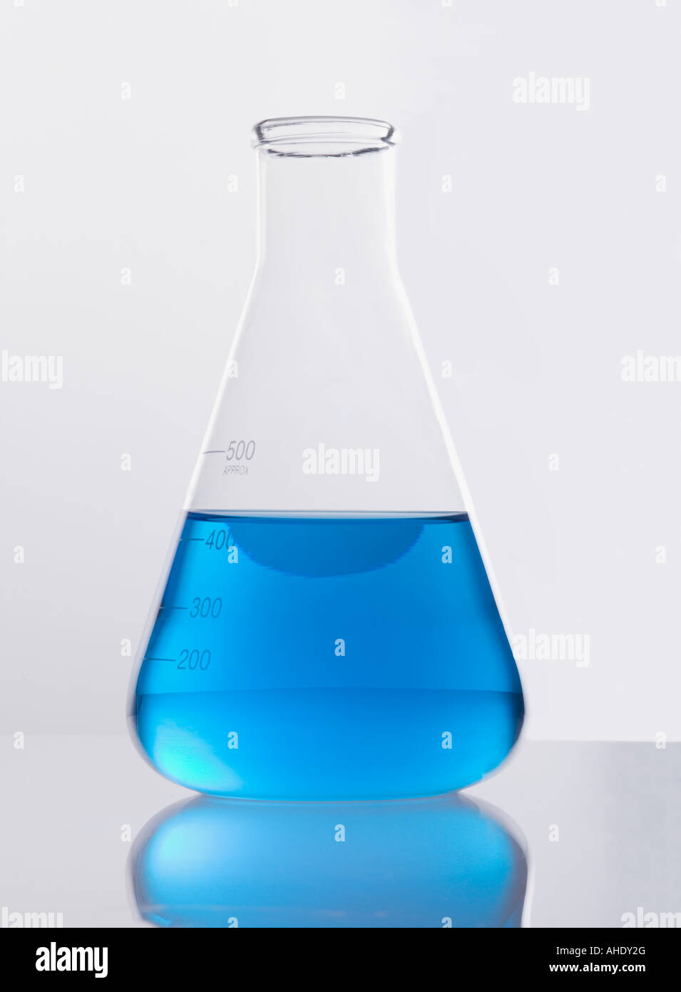 Single glass flask with blue solution Stock Photo Alamy