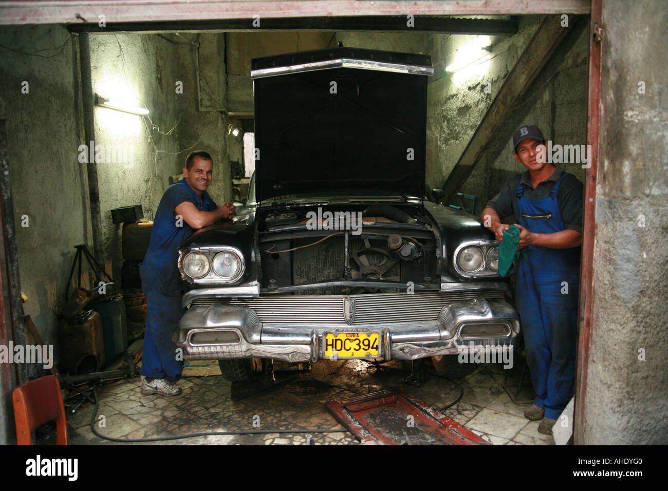 La Habana Cuba two worker in their garage Stock Photo