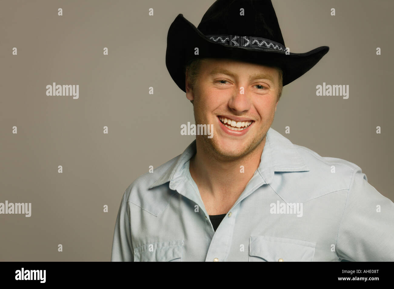 Young man wearing cowboy hat Stock Photo