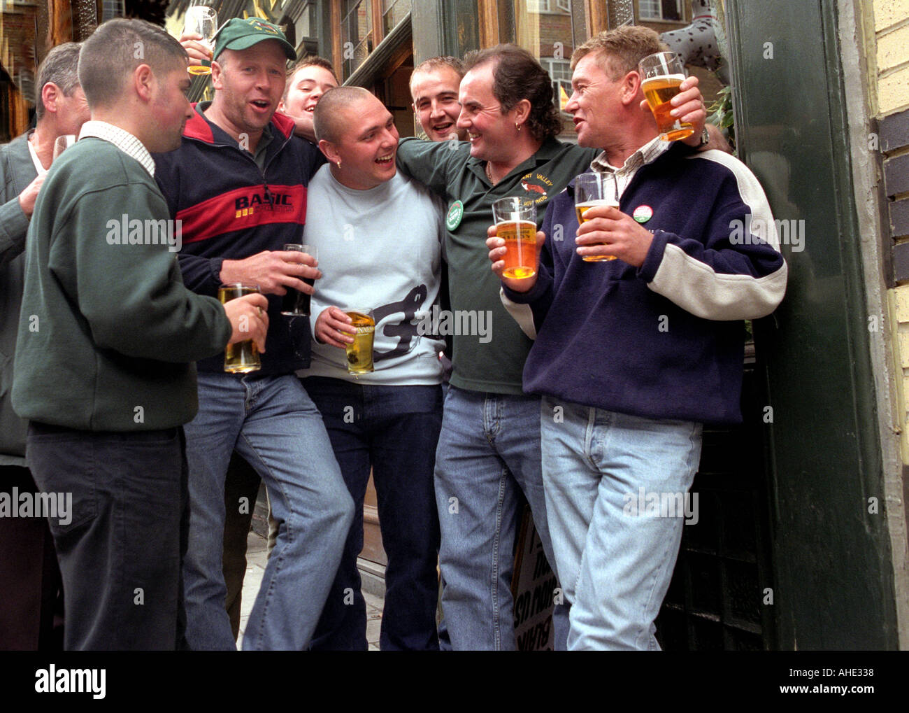 Men out together drinking at the local  pub in London. Stock Photo