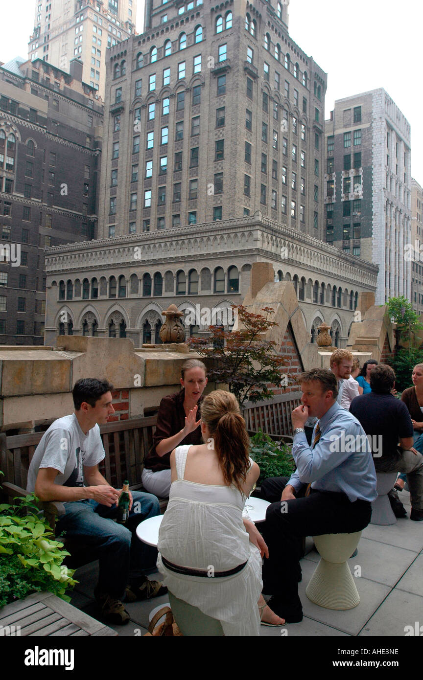 Patrons at the Bookmarks Bar in the Library Hotel in Midtown Manhattan