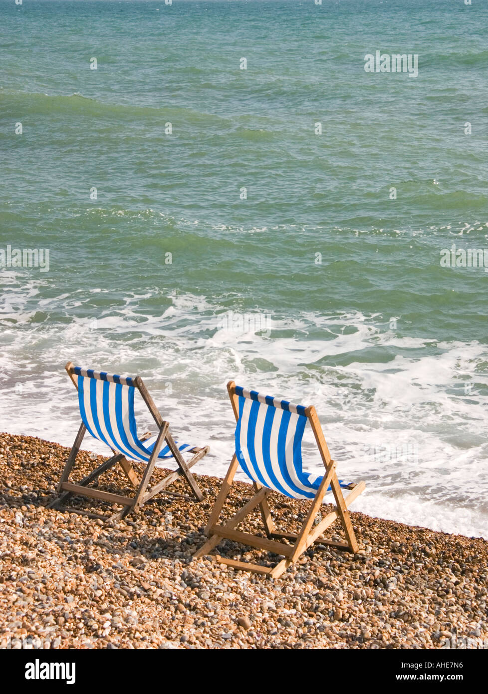 Empty deck chairs on beach hi-res stock photography and images - Alamy