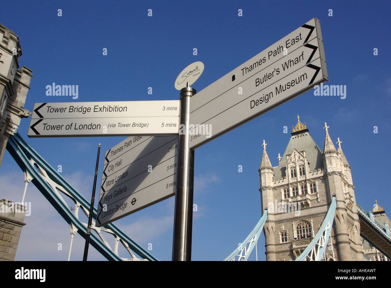 Finger post conveying directional information to locations on the south side of Tower Bridge Stock Photo