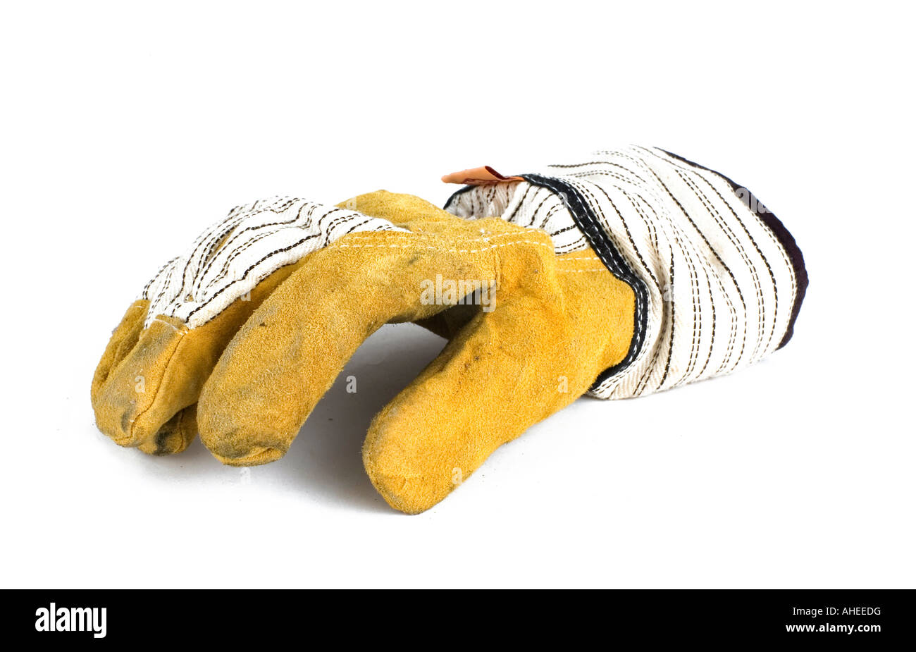 dirty working gloves on white background Stock Photo