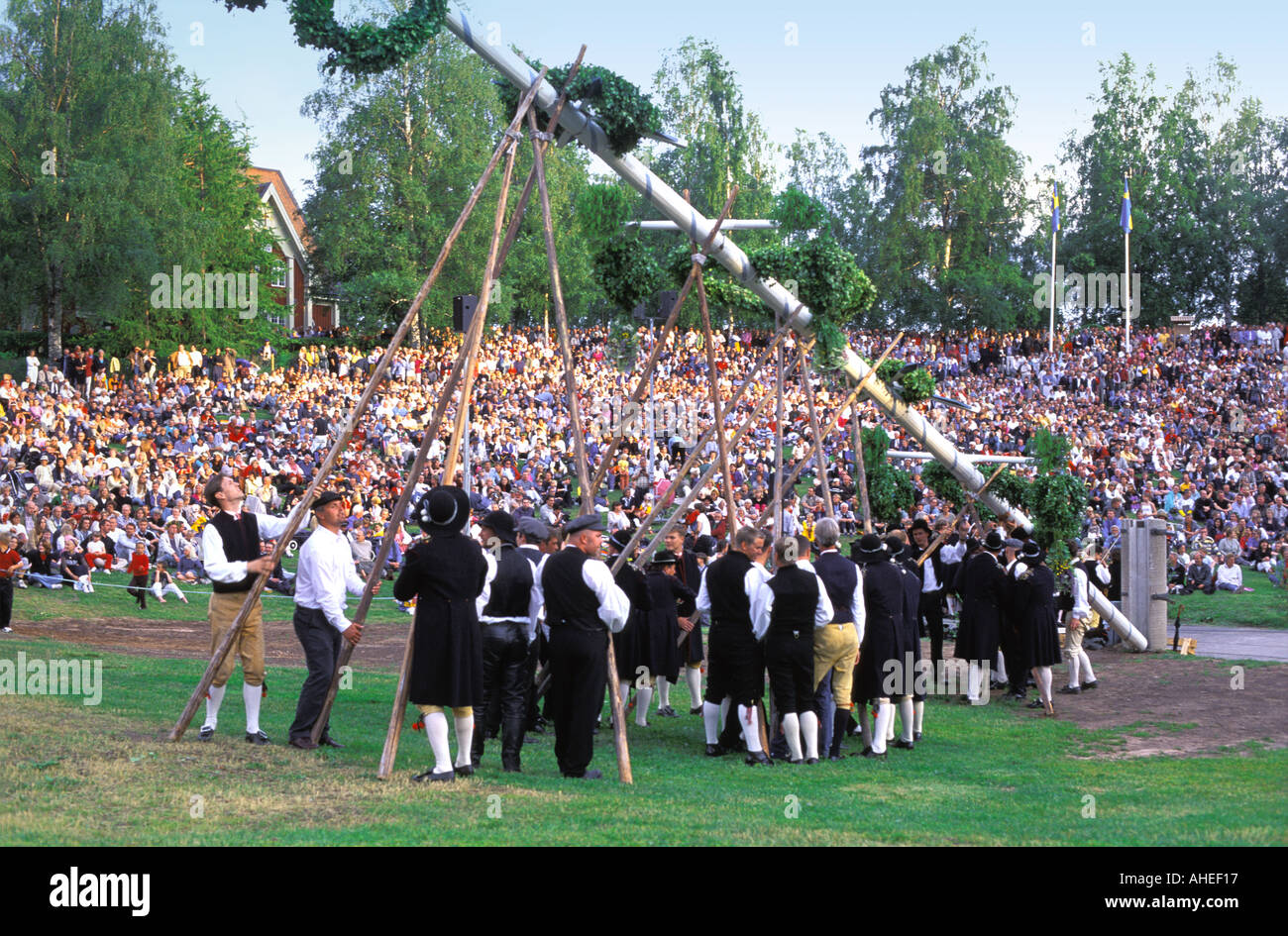 SWEDEN DALARNA LEKSAND MIDSUMMER CELEBRATION MAYPOLE RAISING Stock