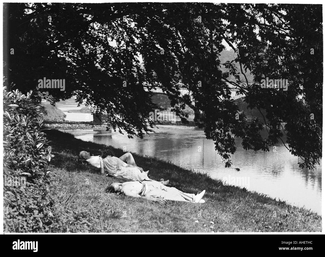 Two men sunbathing Black and White Stock Photos & Images Alamy