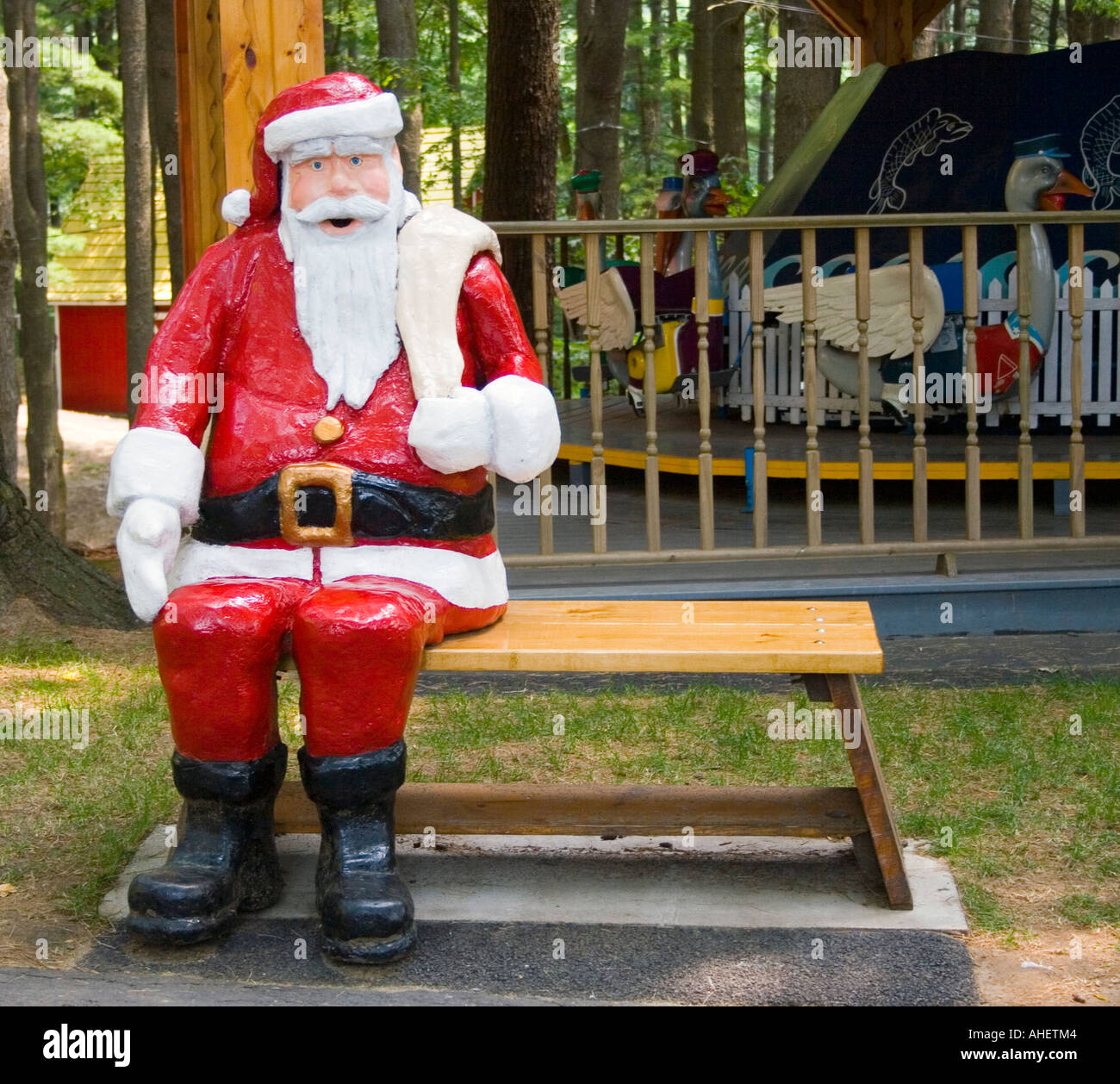Santa Claus on a bench at Magic Forest a fairy tale themed childrens