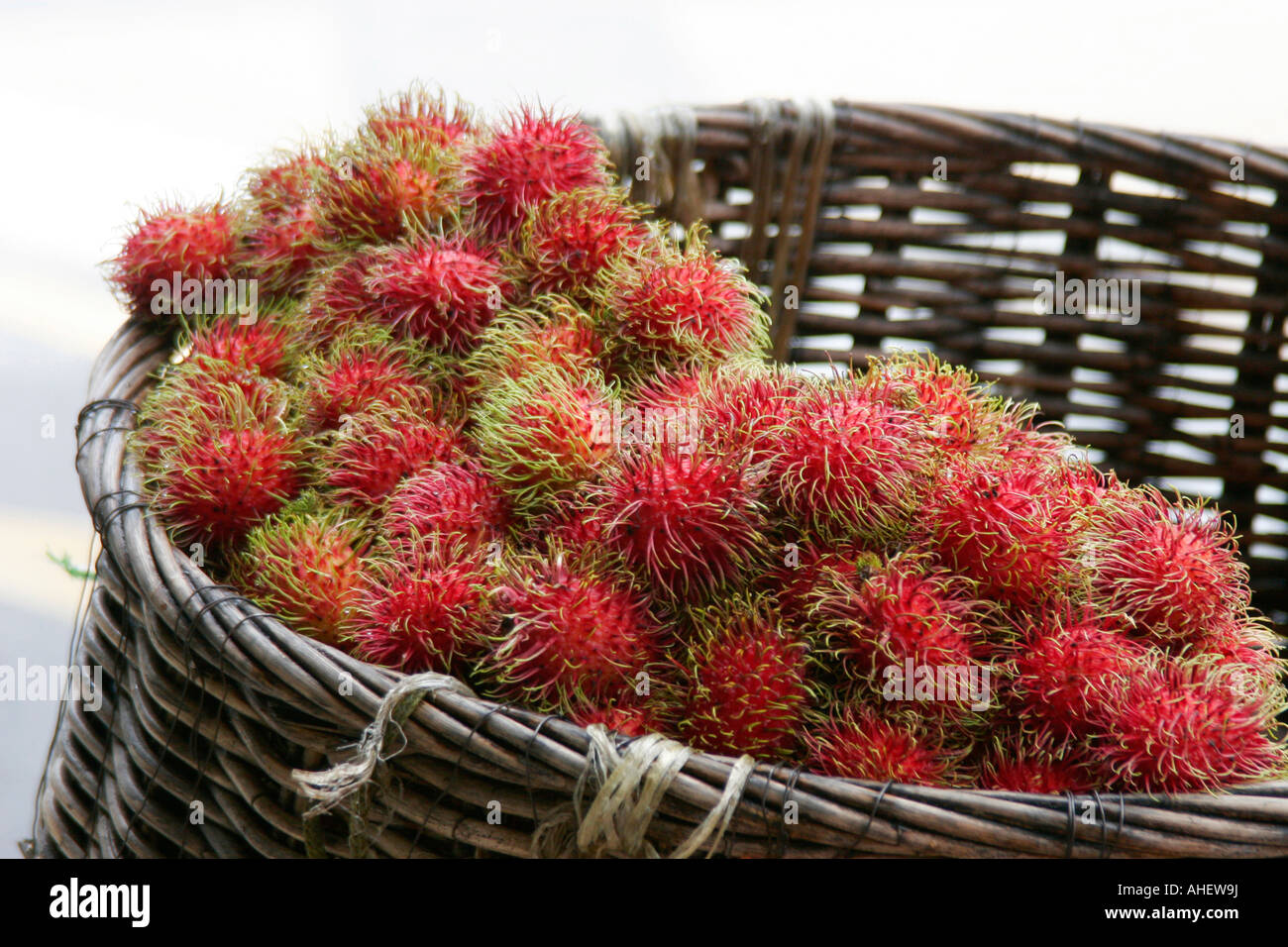 Rambutan Lychee for sale in Basket Stock Photo
