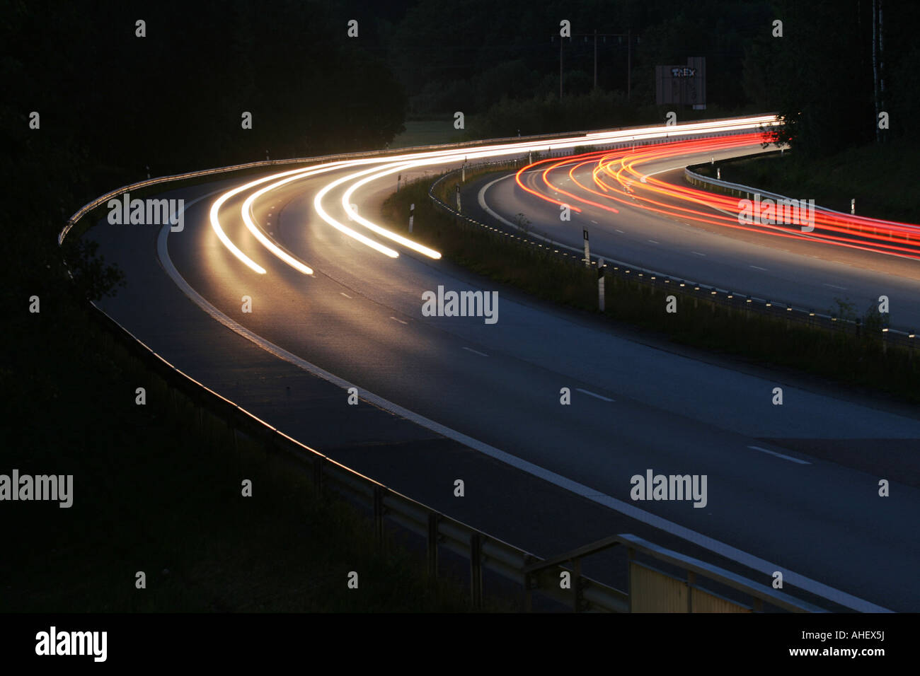 Light trails from cars on a motorway at night Stock Photo - Alamy