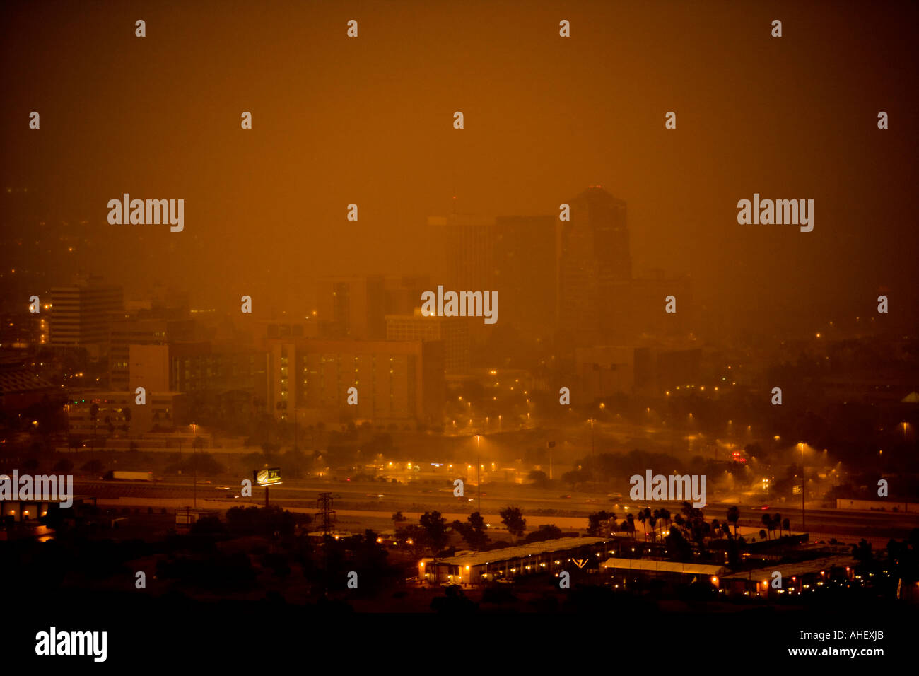 Large dust storm sweeps through downtown Tucson Arizona at dusk. This severe thunderstorm had wind speed clocked at 65 miles per Stock Photo