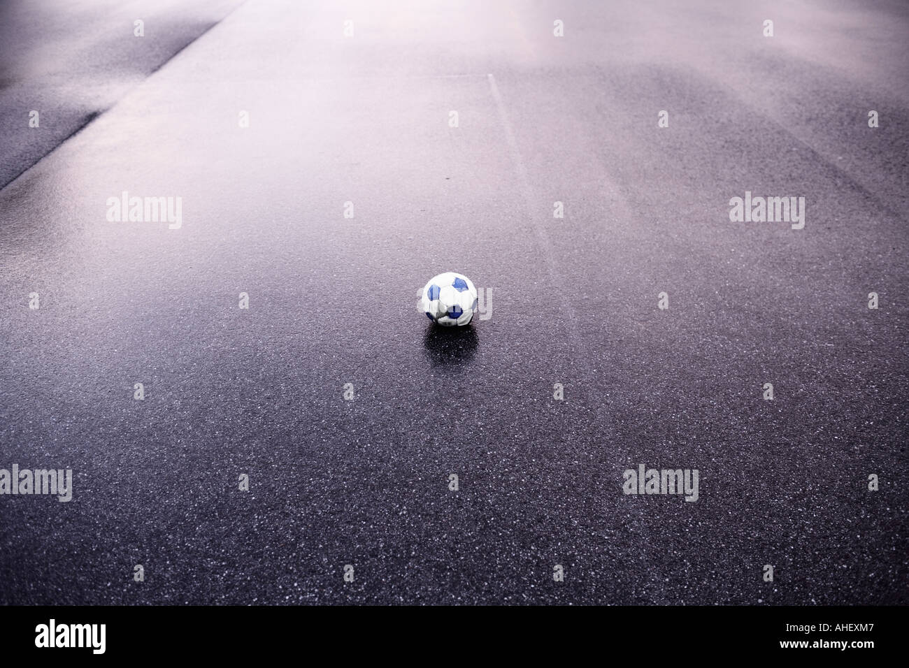 Soccer Ball On Wet Asphalt Munich Germany Stock Photo