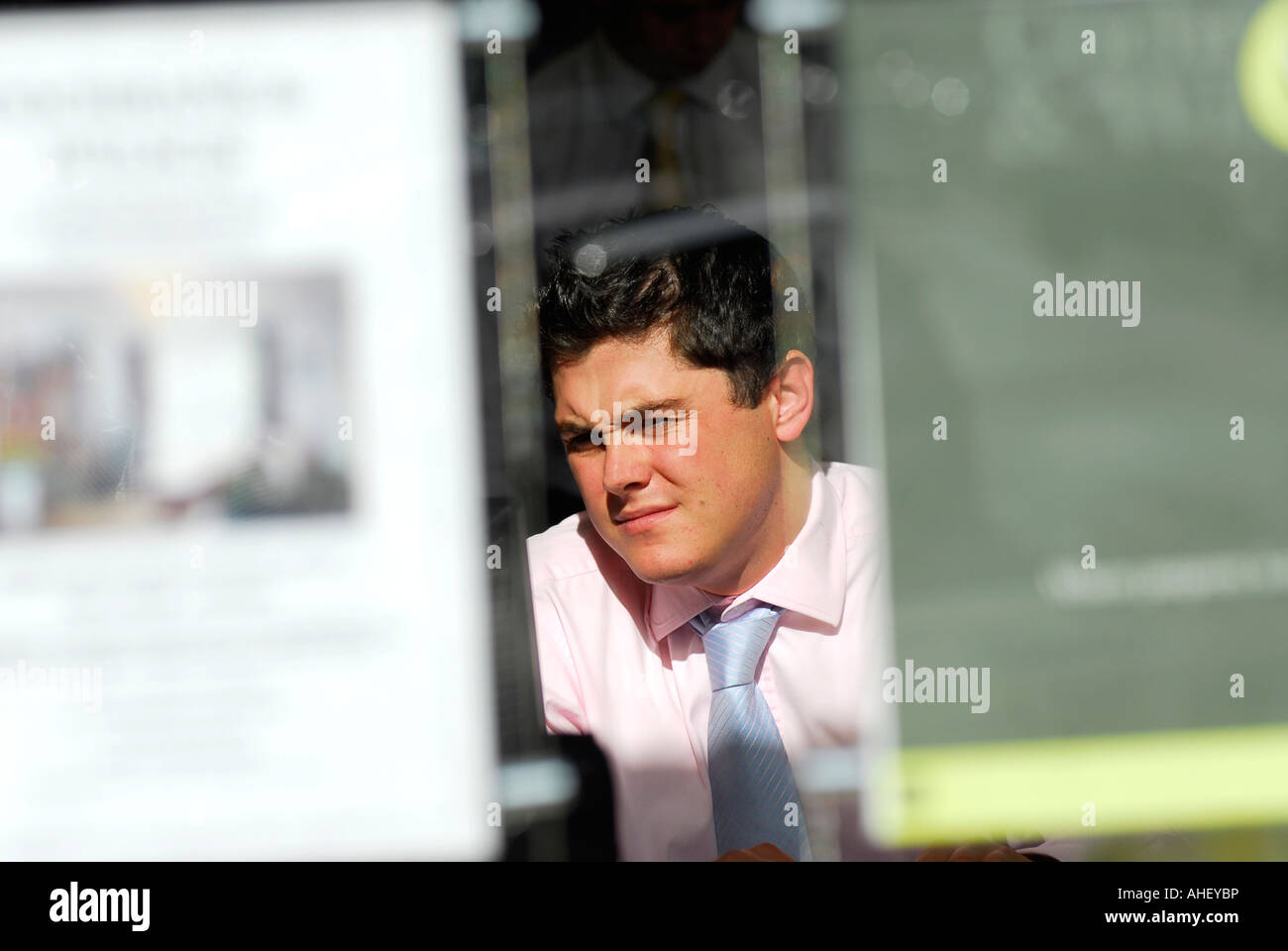 Estate Agent at work in office, Lavender Hill, Clapham, London, England