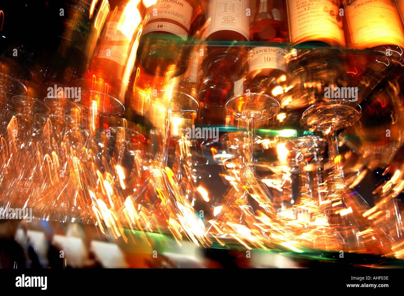 cocktail bottles behind a bar of a club Stock Photo Alamy
