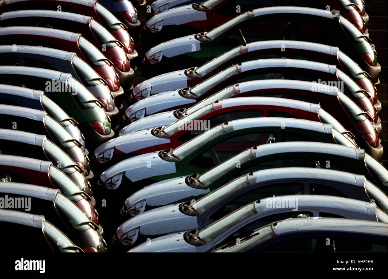 A group of new Ford Ka cars stand in lines as they await shipment from Southampton Docks Hampshire England UK for export Stock Photo
