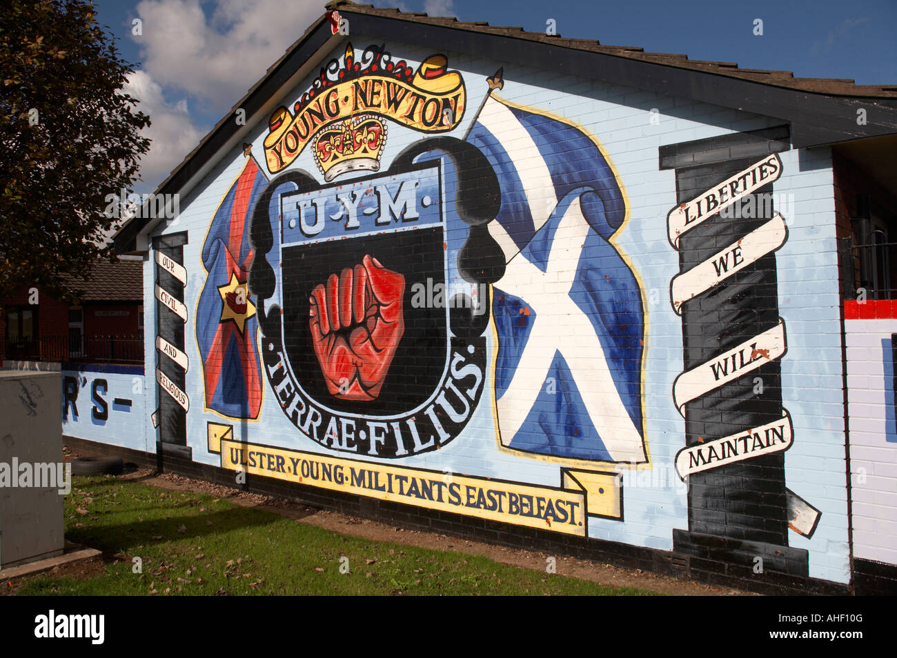 loyalist murals in Lower Newtownards Road area of protestant East Belfast Northern Ireland  Young Newton Ulster Young Militant Stock Photo
