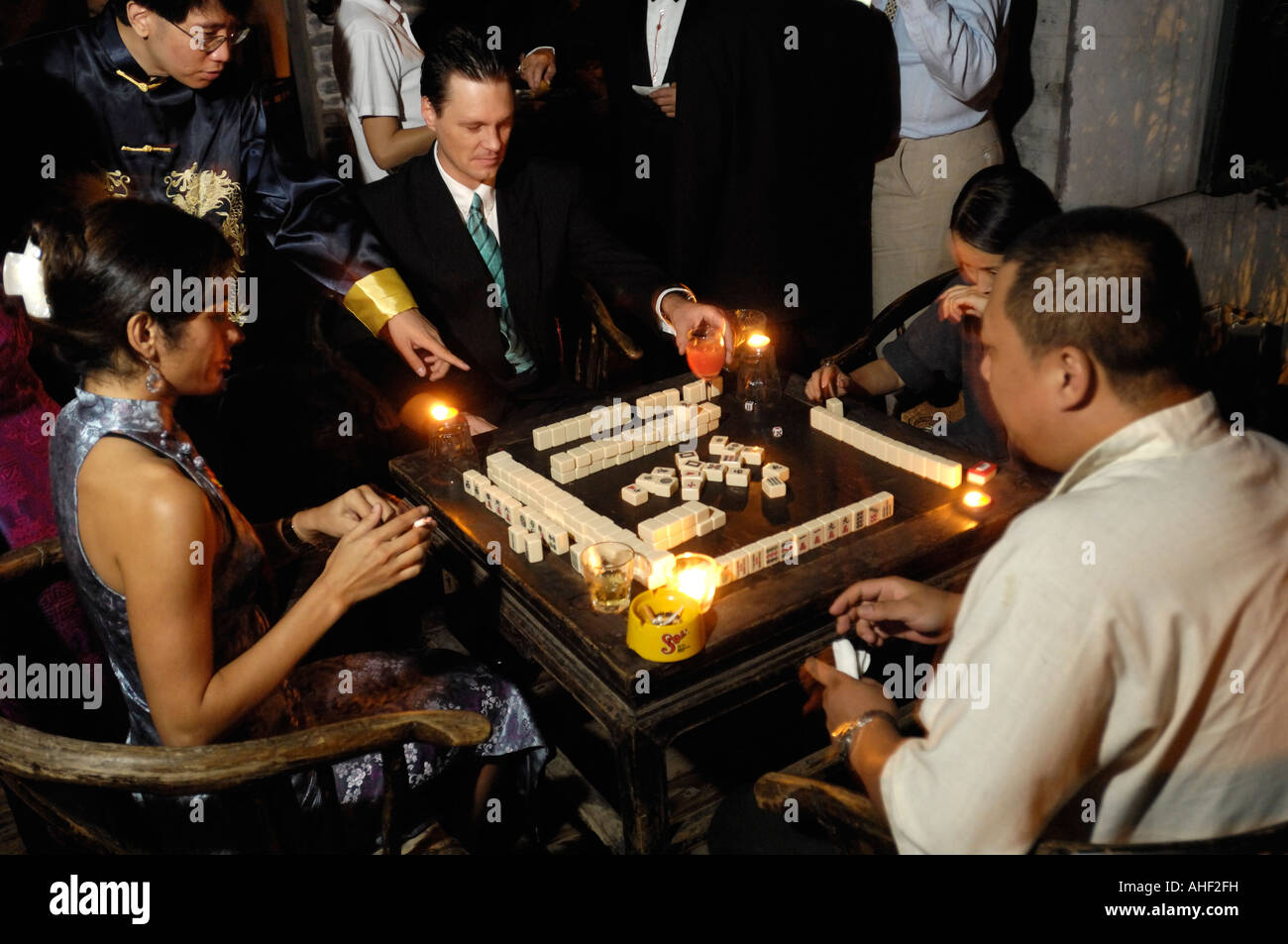 Chinese and western people play mahjong in a Beijing bar 15 Sep 2007 Stock Photo