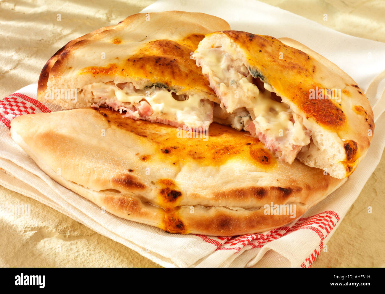 ITALIAN HAM AND CHEESE CALZONE Stock Photo Alamy