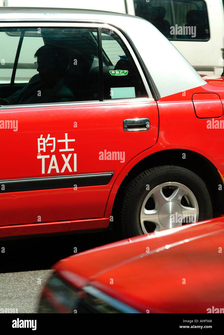 Red taxi hong kong hi-res stock photography and images - Alamy