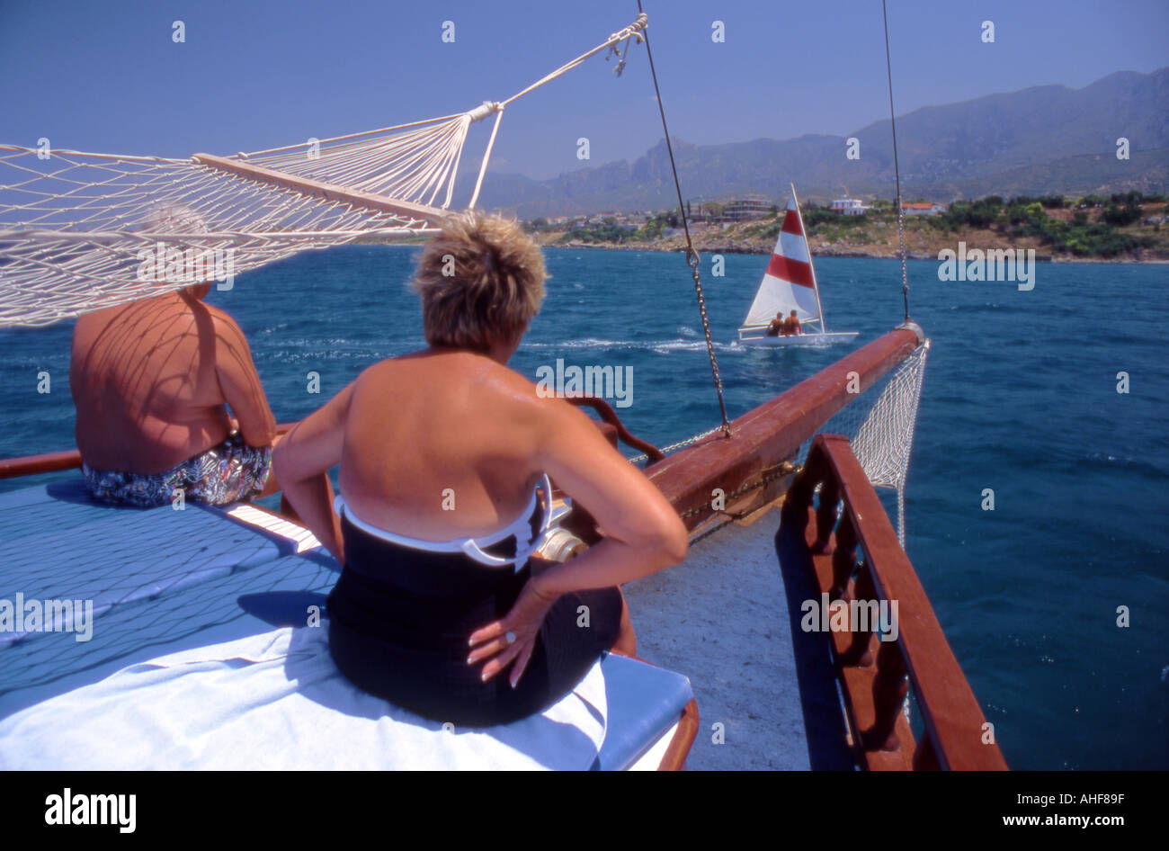 Middle aged man and woman on holiday on boat Cyprus Stock Photo