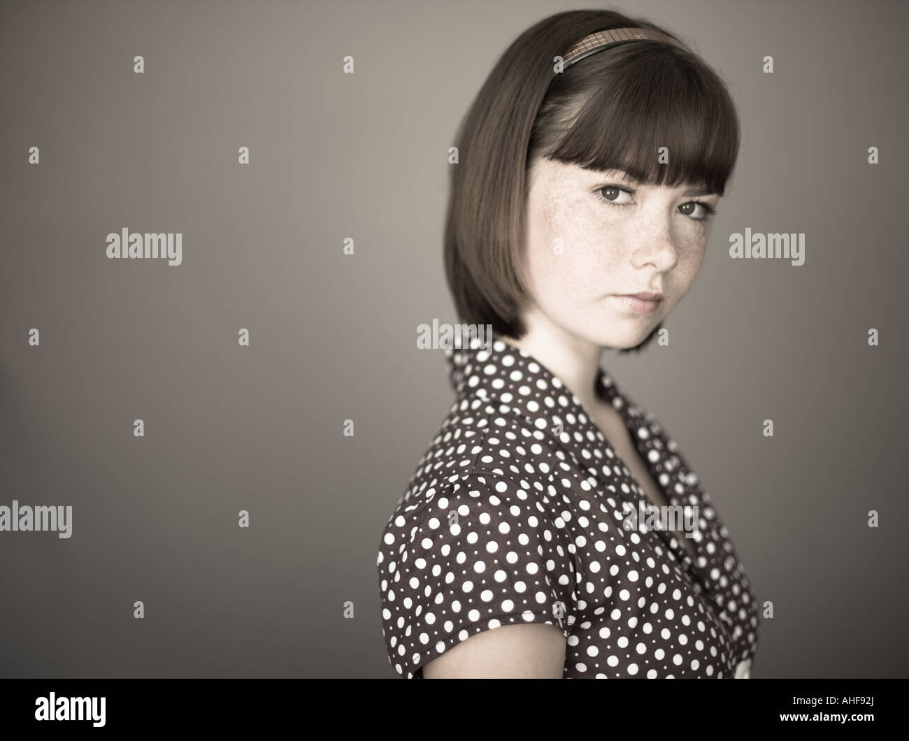 Portrait of young girl in studio Stock Photo - Alamy