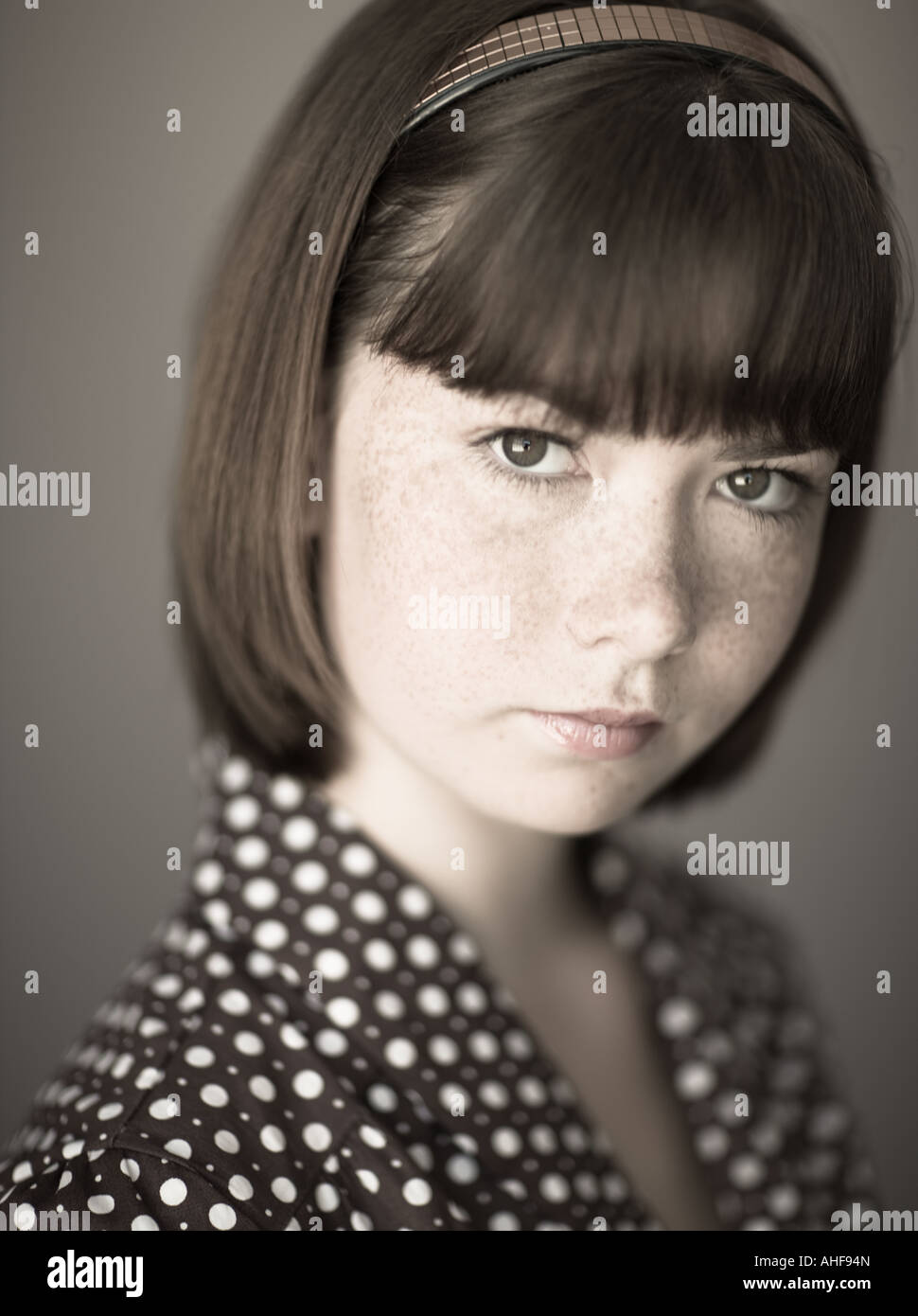 Portrait of young girl in studio Stock Photo - Alamy