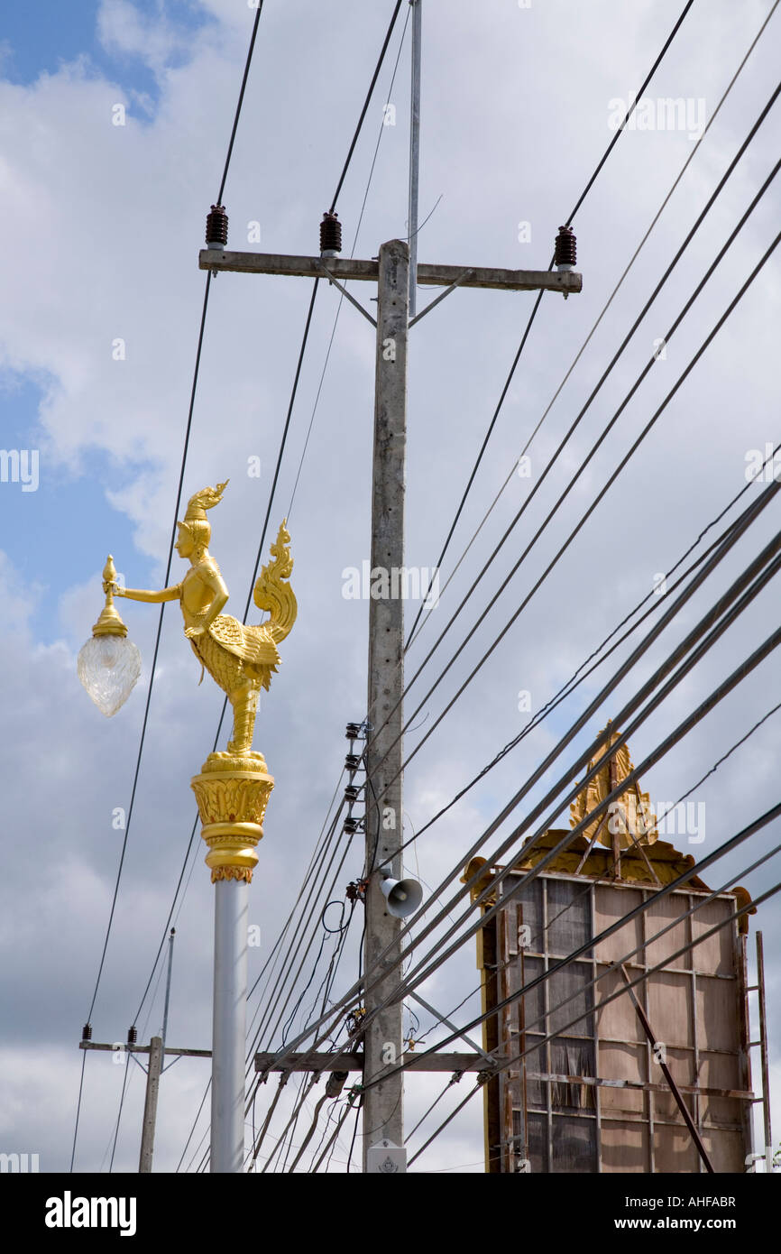 Street lighting and electricity cables and telephone wires in Thailand