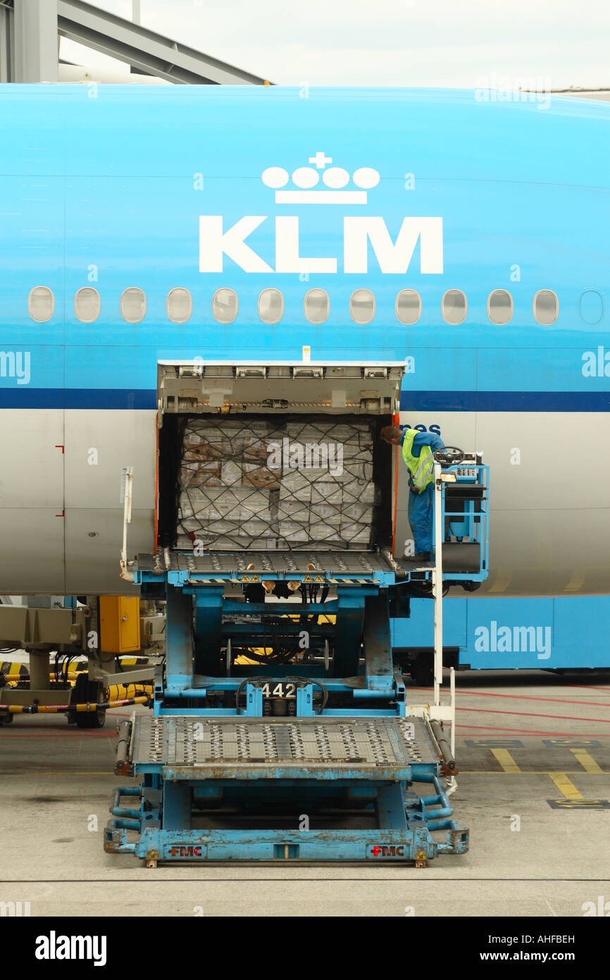 Air freight loading cargo pallet on KLM jet airliner plane Stock Photo