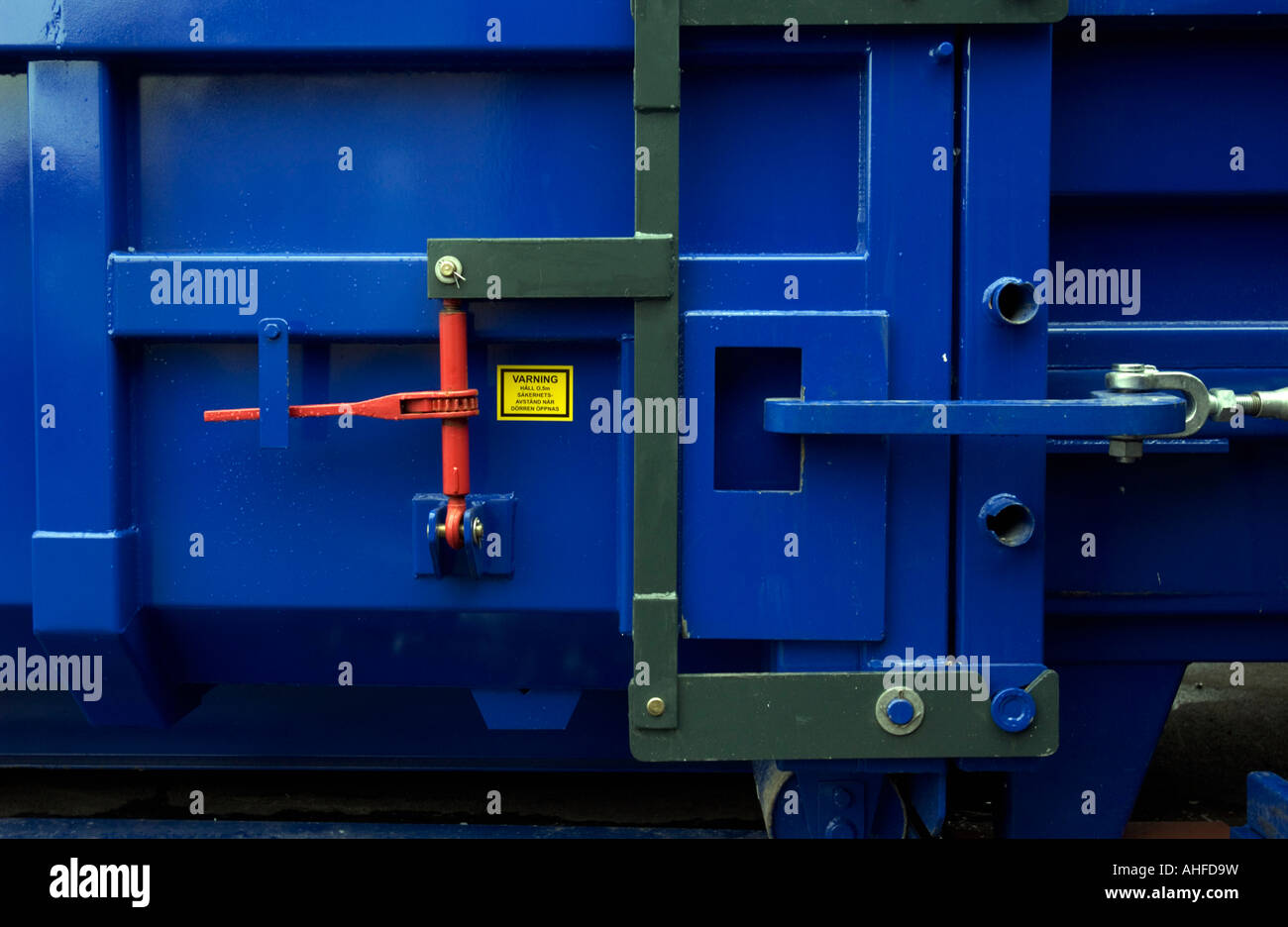 Red locks on a blue container Stock Photo