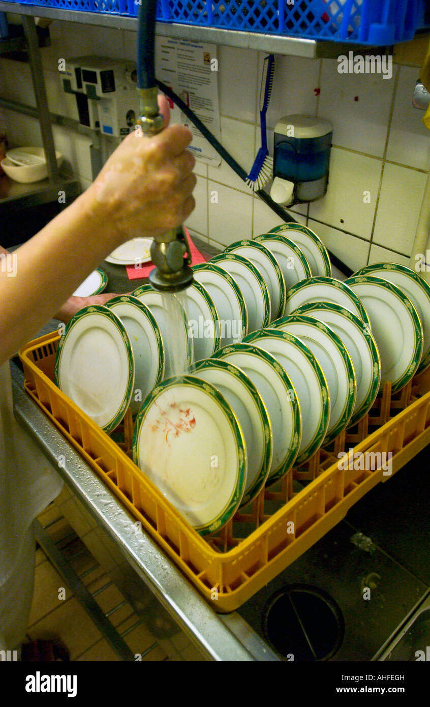 Washing dishes in a restaurant kitchen Stock Photo Alamy