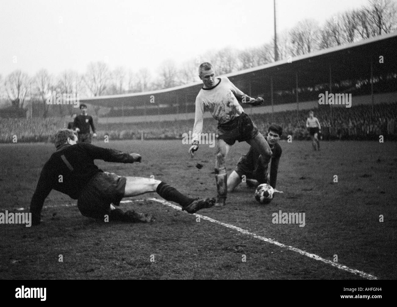 football, Bundesliga, 1965/1966, Borussia Dortmund versus FC Bayern Muenchen 3:0, Stadium Rote Erde, scene of the match, f.l.t.r. keeper Sepp Maier (FCB), Siegfried Held (BVB), Hans Rigotti (FCB) Stock Photo