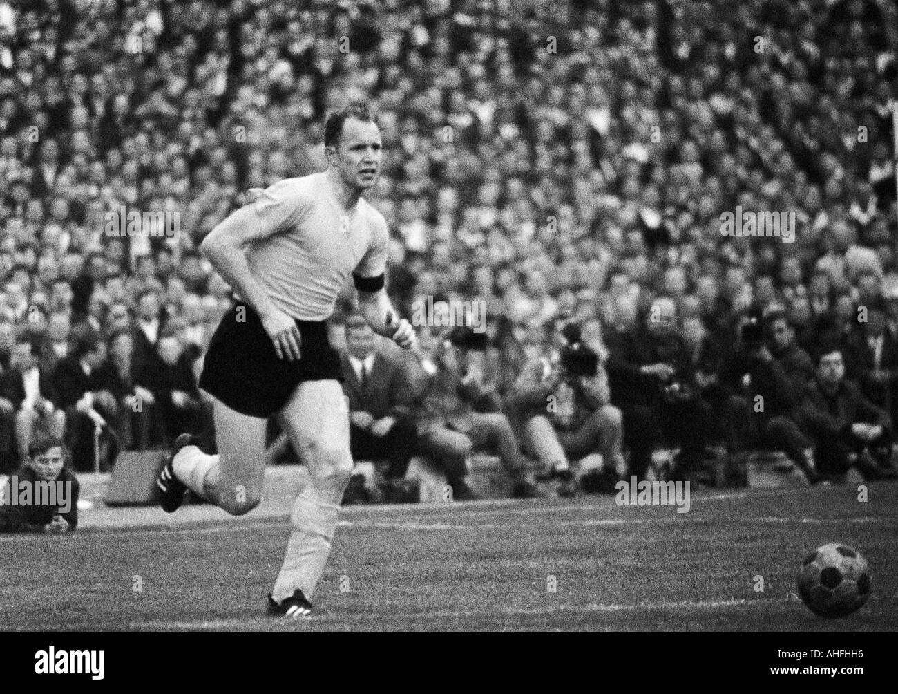 football, Bundesliga, 1965/1966, Borussia Dortmund versus TSV 1860 Munich 0:2, Rote Erde Stadium, scene of the match, Wolfgang Paul (BVB) in ball possession Stock Photo