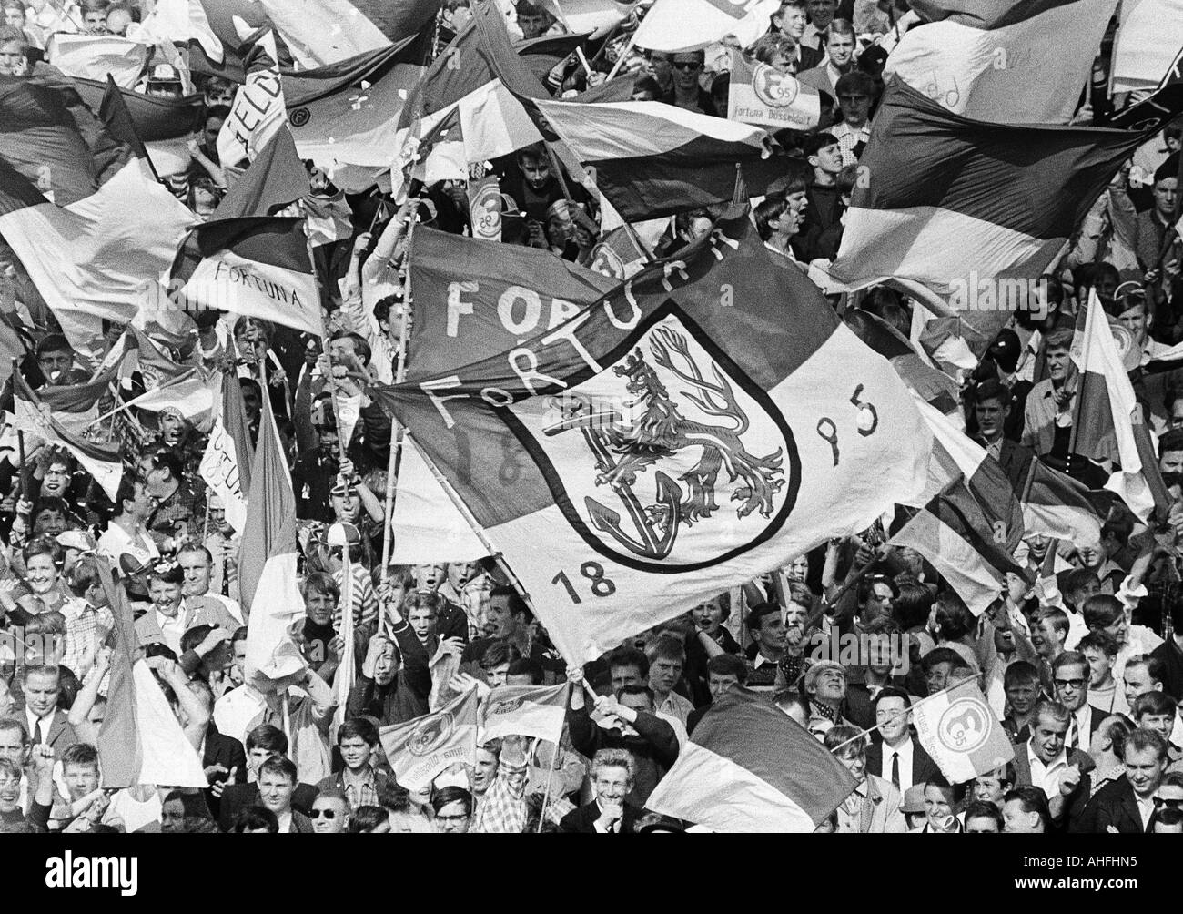 football, Bundesliga, 1966/1967, Fortuna Duesseldorf versus FC Bayern Munich 0:0, Rhine Stadium, crowd of spectators, Duesseldorf fans waving their club flags Stock Photo