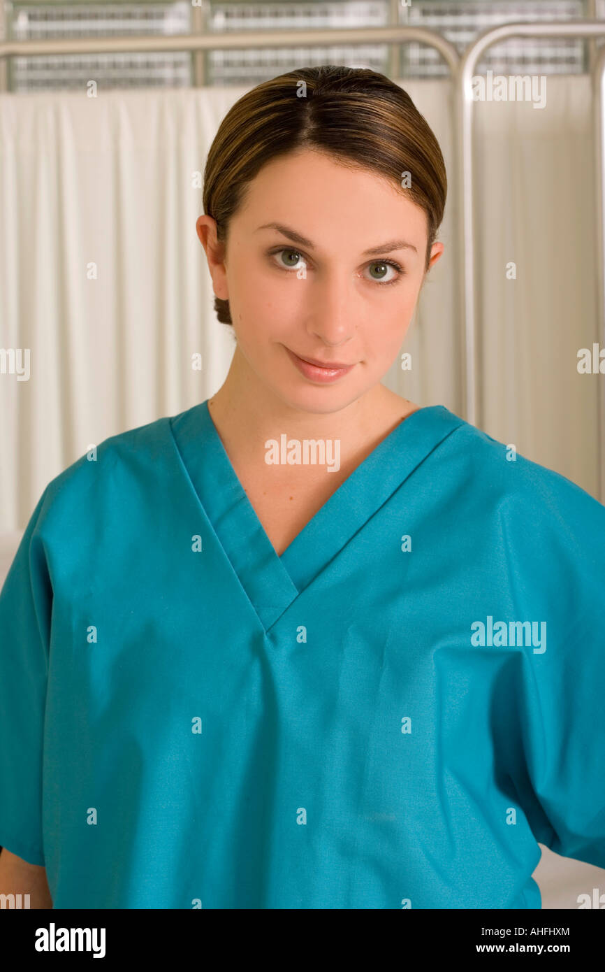 portrait of female healthcare worker in exam room Stock Photo