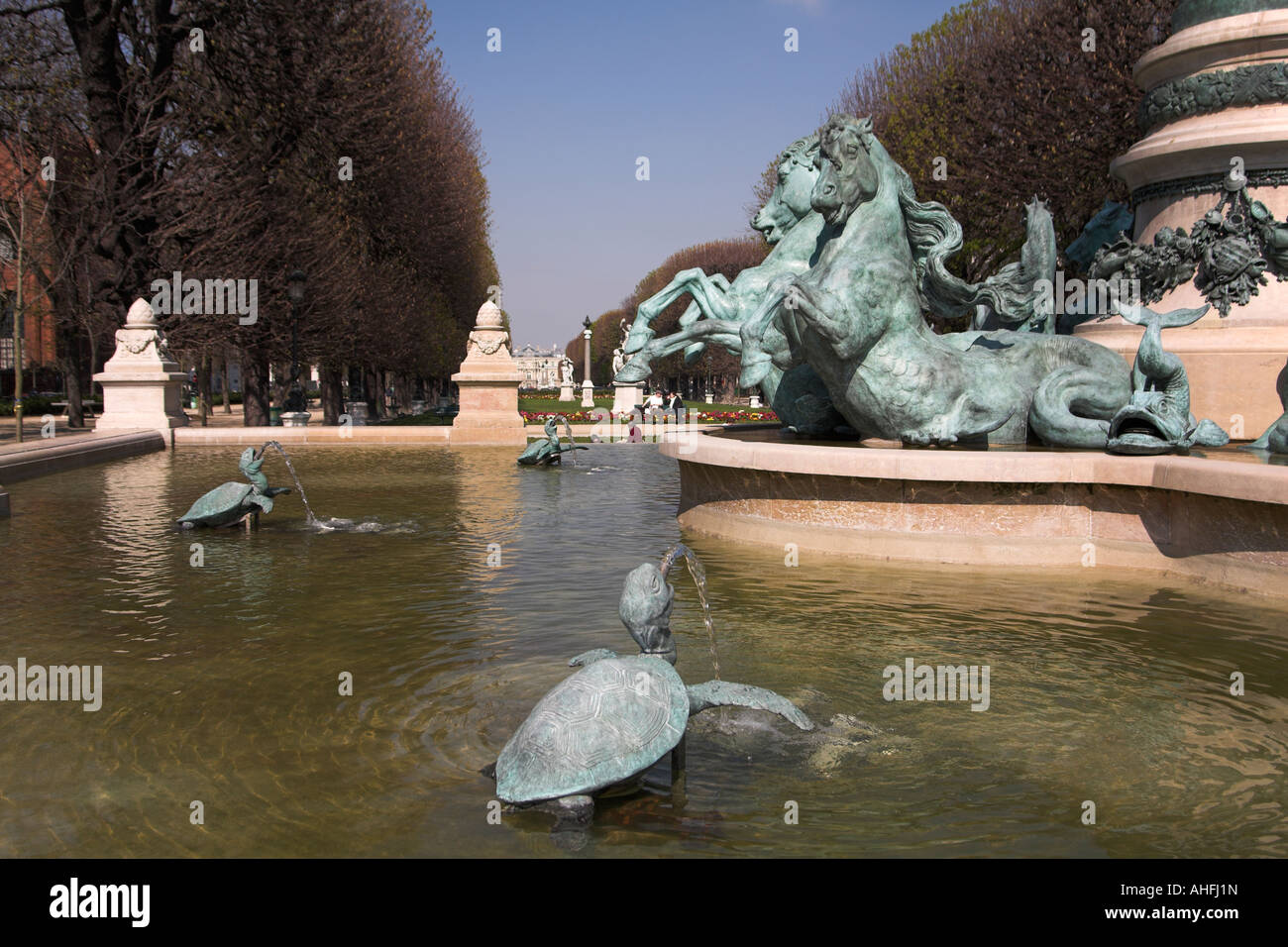 Bronze fountain statue in Marco Polo Garden gardens  jardin Paris France Stock Photo