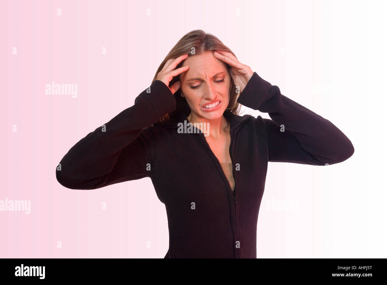 Woman experiencing a pounding headache Stock Photo Alamy