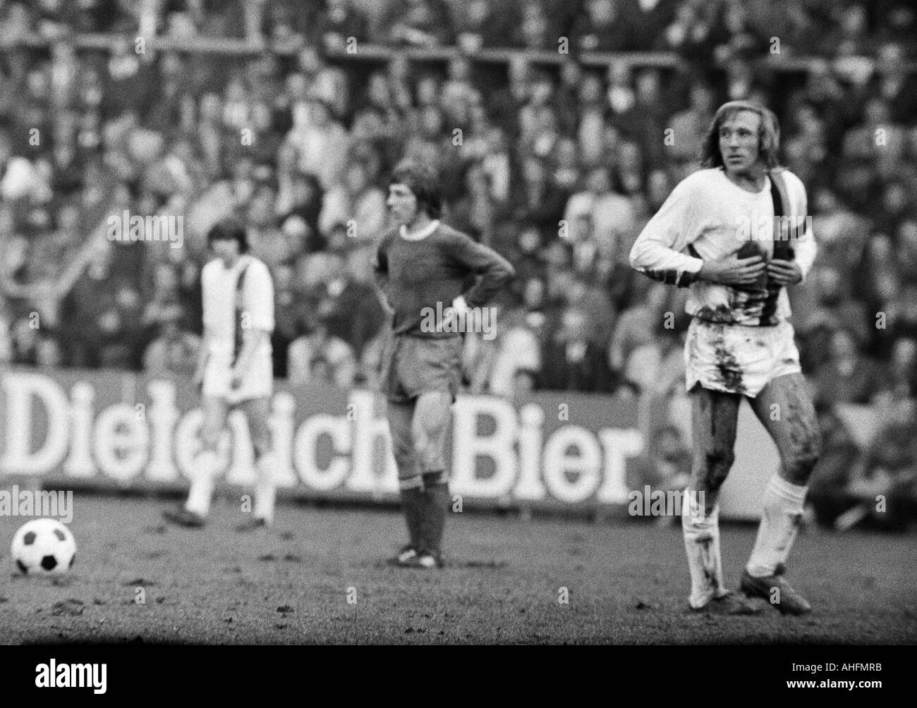 football, DFB Cup, quarter final, first leg, 1971/1972, Borussia Moenchengladbach versus Schalke 04 2:2, Boekelberg Stadium in Moenchengladbach, scene of the match, time-out after a foul play, f.l.t.r. Christian Kulik (MG), Klaus Fischer (S04), the fouled Stock Photo