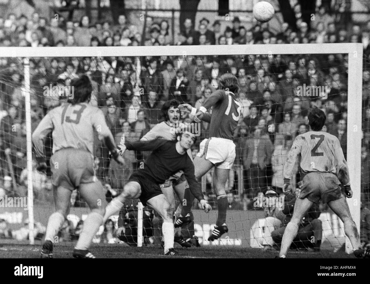 football, Bundesliga, 1971/1972, FC Schalke 04 versus Eintracht Brunswick 5:1, Glueckaufkampfbahn Stadium in Gelsenkirchen, scene of the match, f.l.t.r. Hartmut Konschal (BS, 13), Friedhelm Haebermann (BS), keeper Bernd Franke (BS), Nico Braun (S04, 13), Stock Photo