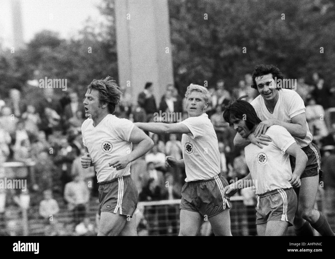 football, Bundesliga, 1971/1972, Rot-Weiss Oberhausen versus Werder Bremen 2:2, Niederrhein Stadium in Oberhausen, scene of the match, rejoicing at the 1:1 equalizer goal to Oberhausen, f.l.t.r. Lothar Kobluhn (RWO), Gert Froehlich (RWO), goal scorer Fred Stock Photo