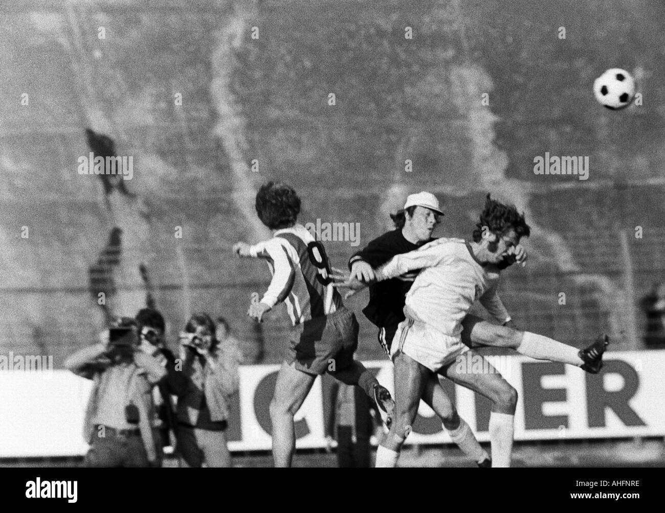 football, Bundesliga, 1972/1973, Stadium am Zoo in Wuppertal, Wuppertaler SV versus VfL Bochum 3:0, scene of the match, f.l.t.r. Guenter Proepper (WSV), keeper Werner Scholz (Bochum), Harry Fechner (Bochum) Stock Photo