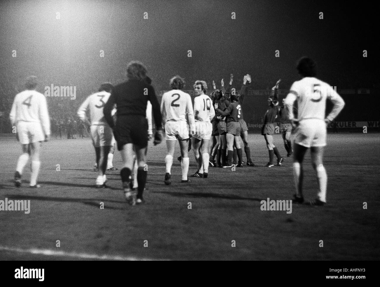 football, Bundesliga, 1972/1973, Stadium am Zoo in Wuppertal, Wuppertaler SV versus FC Bayern Munich 1:1, scene of the match, 1:0 free kick goal to Wuppertal by Juergen Kohle rejoicing together with his teammates, Ulrich Hoeness (FCB, 10) looks back to ke Stock Photo
