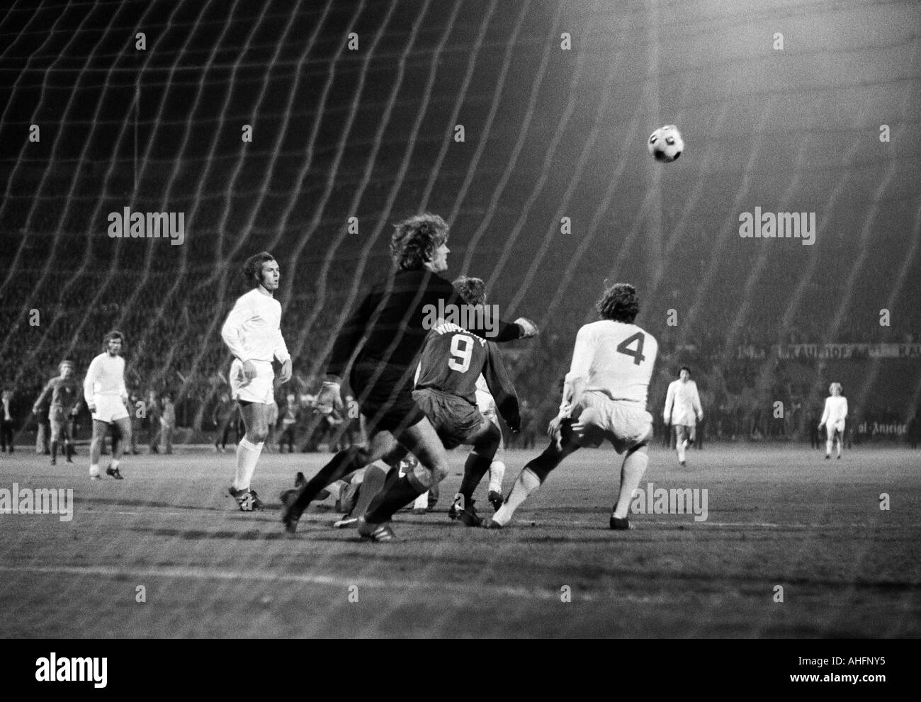 football, Bundesliga, 1972/1973, Stadium am Zoo in Wuppertal, Wuppertaler SV versus FC Bayern Munich 1:1, scene of the match, f.l.t.r. Paul Breitner (FCB), Franz Beckenbauer (FCB), keeper Sepp Maier (FCB), Guenter Proepper (WSV, 9), Georg Schwarzenbeck (F Stock Photo