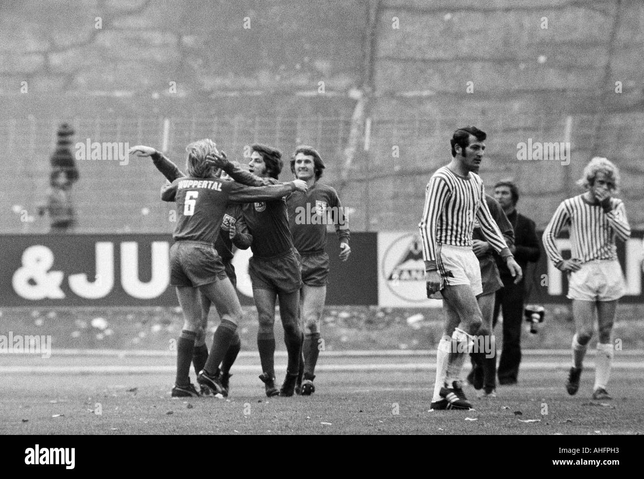 football, Bundesliga, 1972/1973, Stadium am Zoo in Wuppertal, Wuppertaler SV versus Hertha BSC Berlin 4:1, scene of the match, goal to Wuppertal, f.l.t.r. Bernhard Hermes (WSV, 6), Gustav Jung (WSV) covered, Heinz Dieter Loemm (WSV), Guenter Proepper (WSV Stock Photo